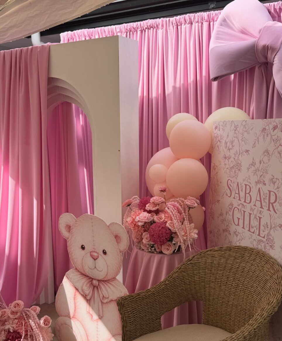Pink teddy birthday backdrop styling